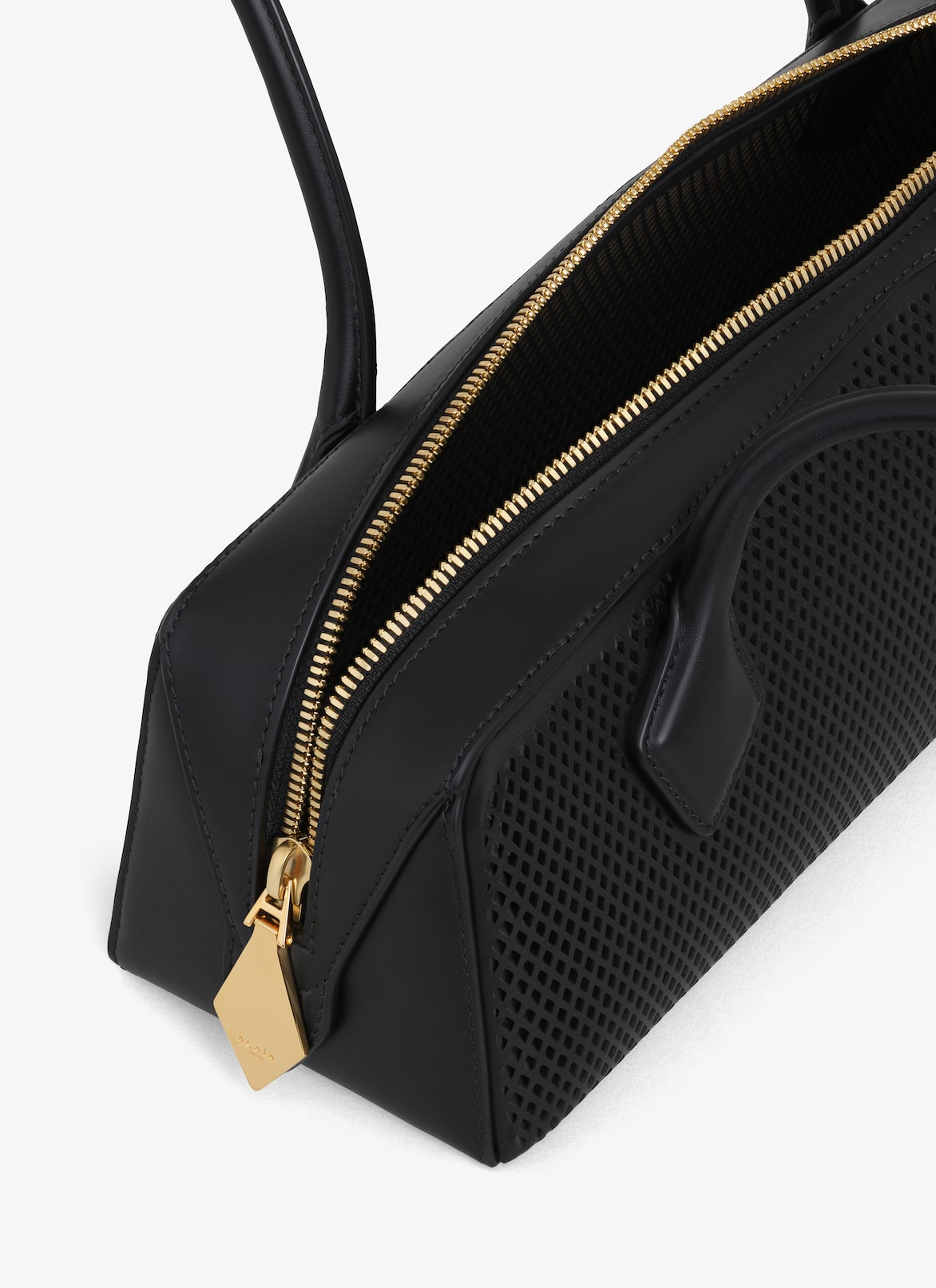 LE TECKEL MEDIUM BAG IN PERFORATED LEATHER ALAÏA BLACK LE TECKEL MEDIUM BAG IN PERFORATED LEATHER